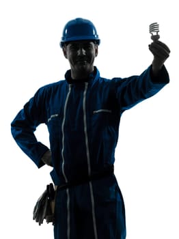 one caucasian man holding light bulb  silhouette in studio on white background