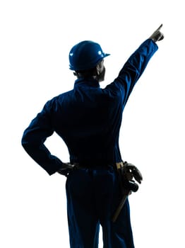one caucasian man construction worker pointing showing silhouette portrait in studio on white background