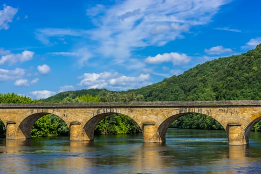 medevial bridge over the dordogne river perigord france