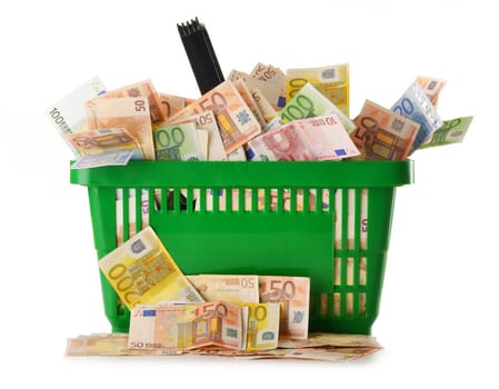 Composition with Euro banknotes in shopping basket. European Union currency