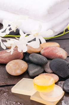 Spa concept with orchids and river stones outdoor