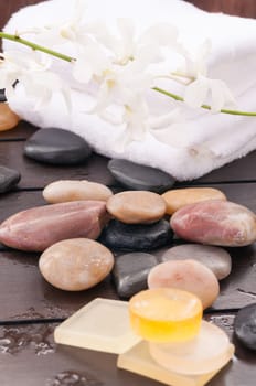 Spa concept with orchids and zen stones outdoor