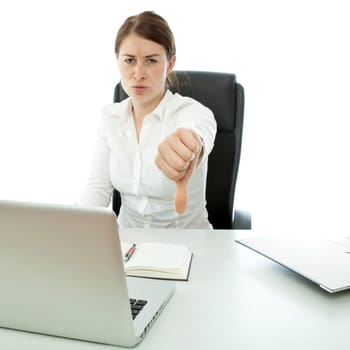 young brunette business woman thumb down on desk