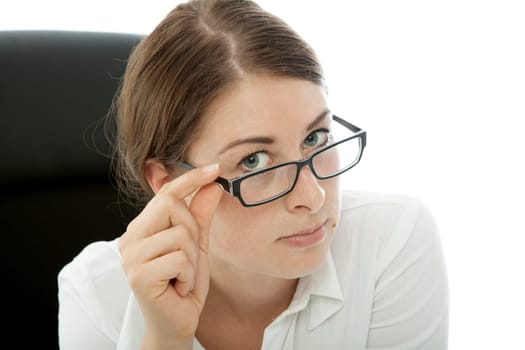 young brunette business woman squint over glasses on white background