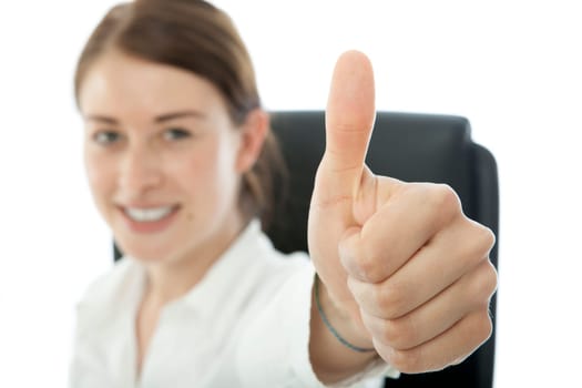 young brunette business woman thumb up and smiles