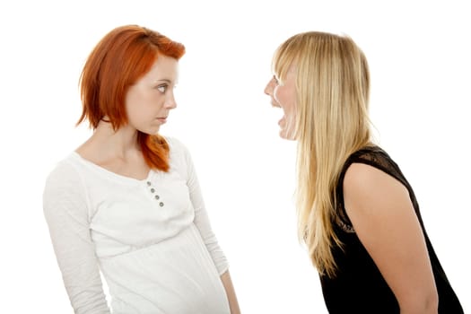 young beautiful red and blond haired girls in front of white background