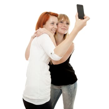 young beautiful red and blond haired girls in front of white background