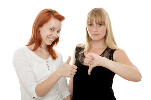 young beautiful red and blond haired girls in front of white background