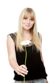 young beautiful blond haired girl gives you a flower in front of white background