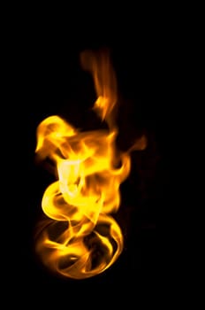fire with a black background, abstract background.