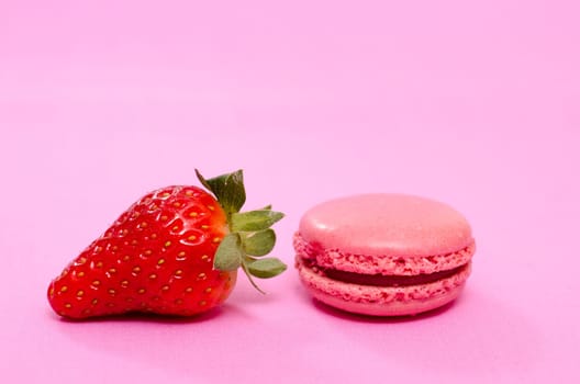 Sweet dessert ash made from strawberries and almonds as a French macaron