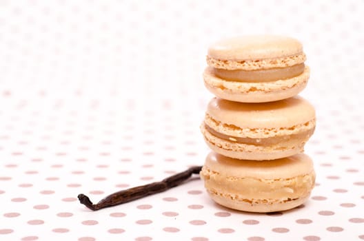 Three macarons with vanilla aroma