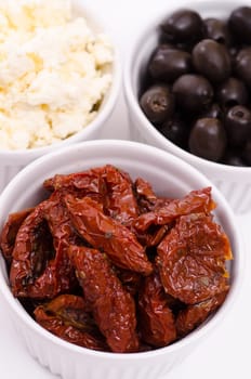 Dried tomatoes pickled in oil in a bowl