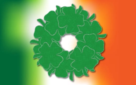 Lucky four leaf clovers in a wreath shape over an Irish Flag