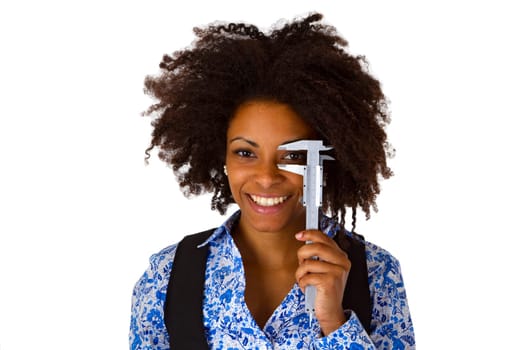 Attractive african american woman with caliper - isolated on white background