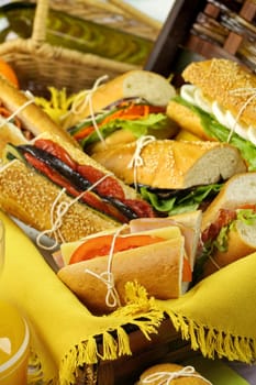 Assorted salad rolls in a picnic basket ready to go.