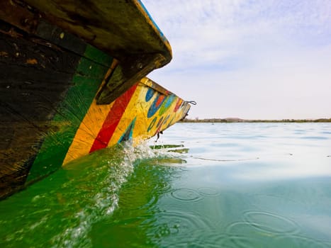 Traditional fisherman boat on the Niger river in Mali, Western Africa