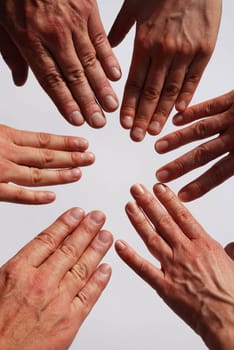 many hands symbolizing team, family, unity
