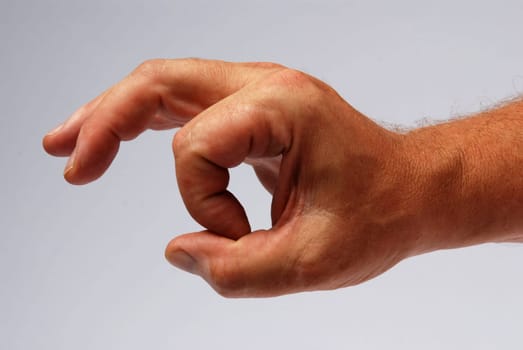 male hand doing the okey gesture
