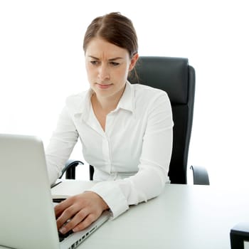 young brunette woman is uncertain on desk