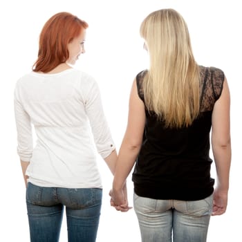 young beautiful red and blond haired girls in front of white background