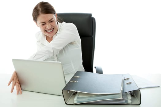 young brunette business woman in rage and throw laptop desk