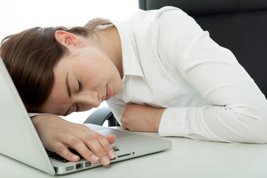 young brunette business woman fall asleep on computer