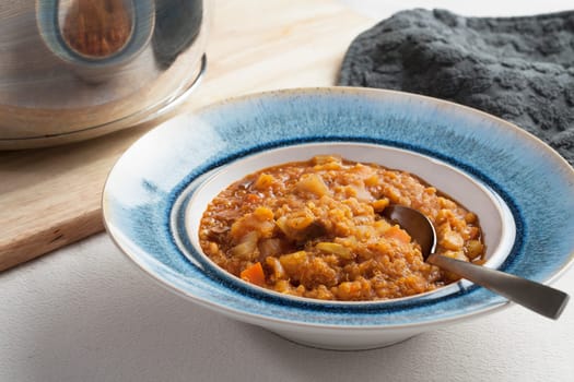 Fresh homemade quinoa stew with fresh vegetables.