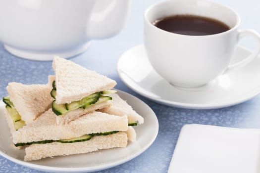 Cucumber sandwiches and cup of tea