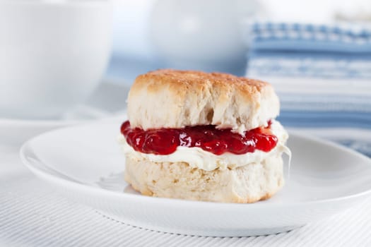 English scone with clotted cream and Jam