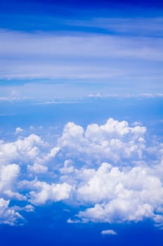 a view of sky, above of clouds.