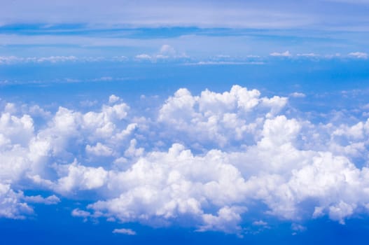 a view of sky, above of clouds.