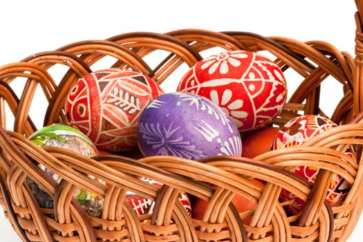 Detail of the painted Easter Eggs in wicker basket - basketful of Ester Eggs