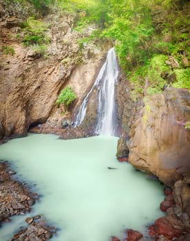 Beautiful waterfall in rainforest. Bali