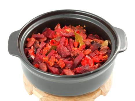 Beef and vegetables stewed in hot pot on white background