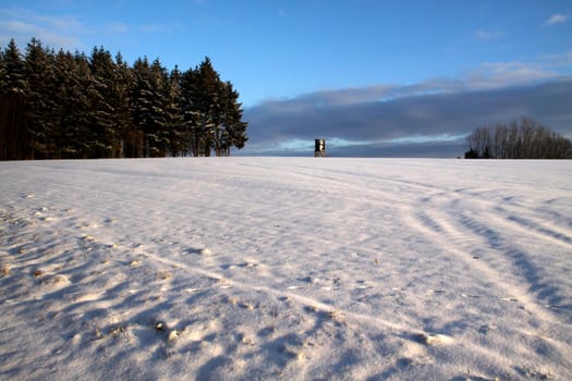 Winter landscape with high seat