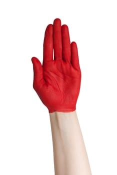 a red painted hand signalizing danger, risk or a colorful handshake