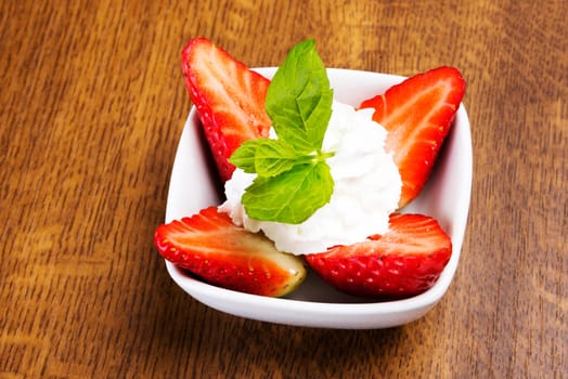 Fresh strawberry dessert with mint