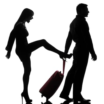 one caucasian couple man and woman dispute separation in studio silhouette isolated on white background