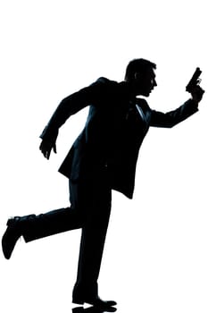 one caucasian man full length silhouette in studio isolated white background