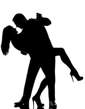one caucasian couple lovers  man and woman dancing tango in studio silhouette isolated on white background