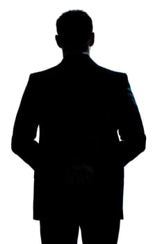 one caucasian man portrait silhouette backside standing hands behind back in studio isolated white background