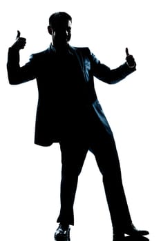 one caucasian man double thumb up full length silhouette in studio isolated white background