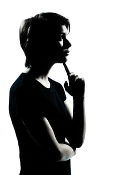 one caucasian young teenager silhouette boy or girl thinking portrait in studio cut out isolated on white background