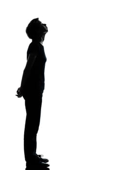one caucasian young teenager silhouette boy or girl full length in studio cut out isolated on white background