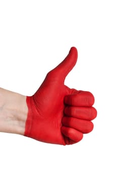 a red painted hand showing one thumb up, isolated