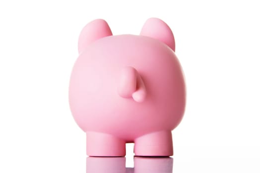 Piggy bank back. Isolated on white.