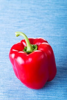 Red sweet pepper on table