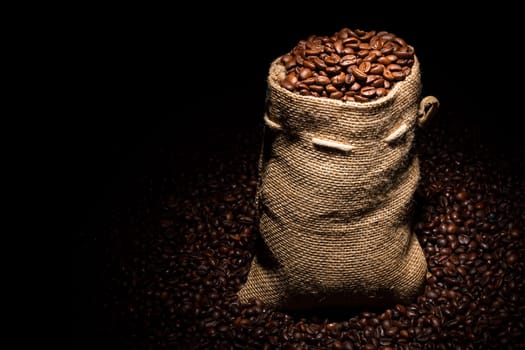 coffee sack in the middle of coffee beans