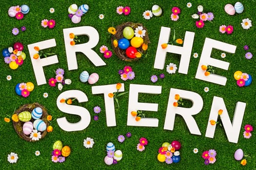 Happy Easter lettering on a green meadow